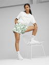 Puma Bílo-zelené dámské vzorované teplákové kraťasy Puma ESS+ Blossom 5" AOP Shorts TR