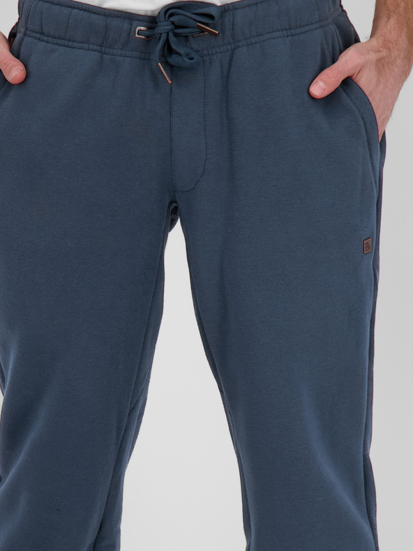 Alife and Kickin Tmavě modré pánské tepláky Alife and Kickin