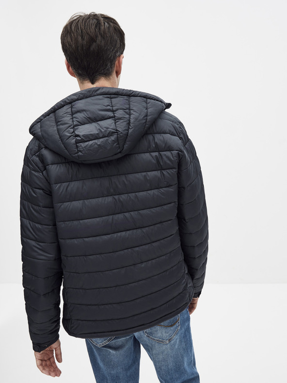 Celio Tmavě modrá prošívaná bunda Celio Sucolor