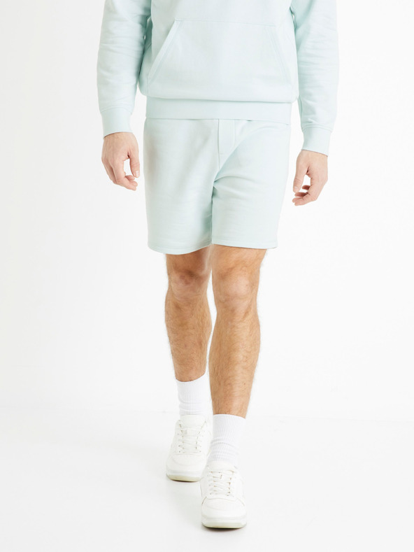 Celio Světle modré pánské teplákové kraťasy Celio Toshort