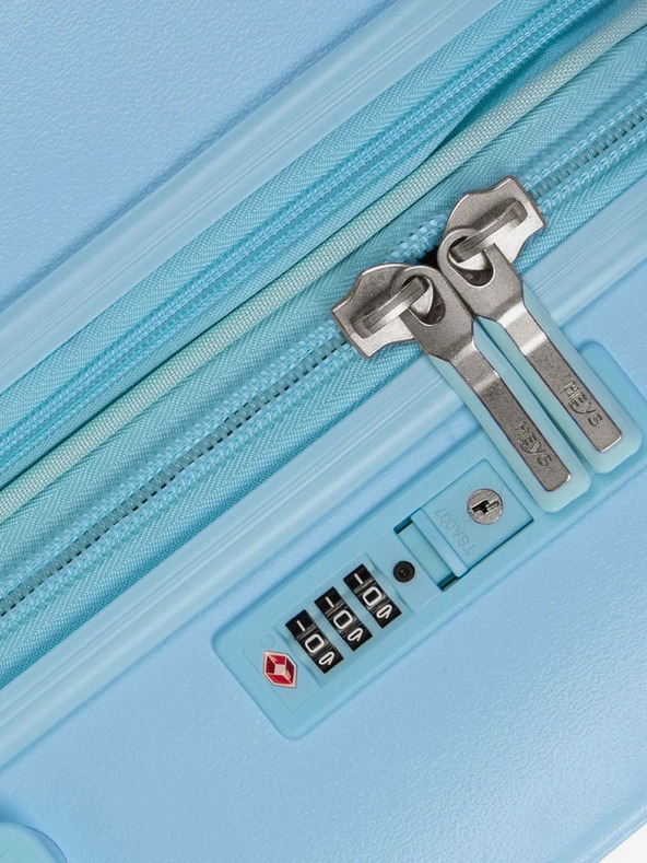 Heys Světle modrý cestovní kufr Heys Pastel S