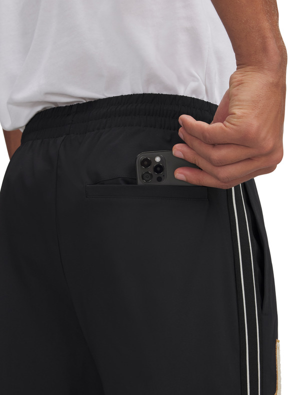 Under Armour Pánské sportovní kalhoty Under Armour Courtside Snap Pant