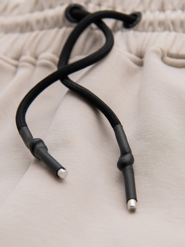 Ombre Clothing Pánské tepláky s žebrovanými manžetami a ozdobným zipem - pískové Ombre Clothing