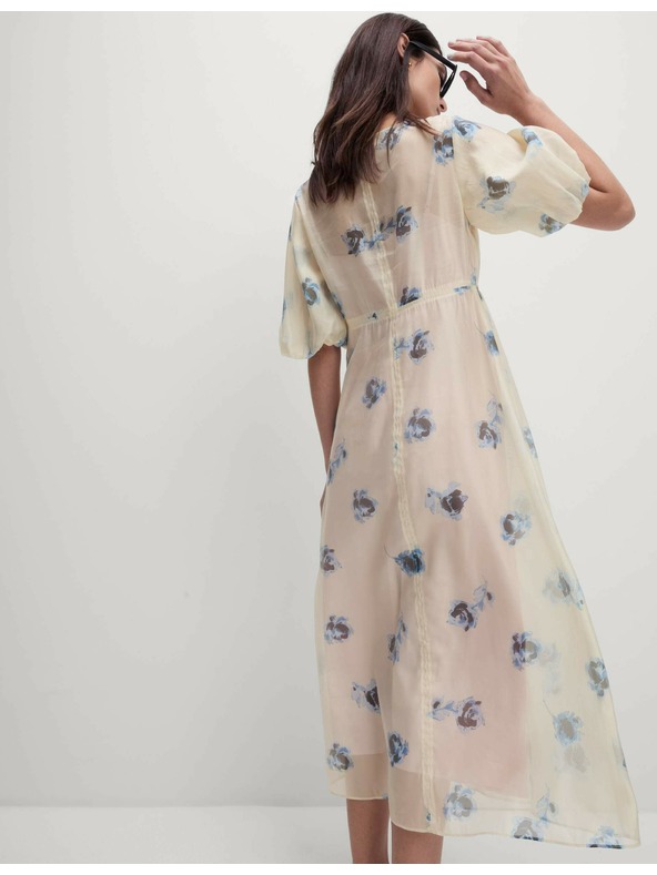 Marks & Spencer Průhledné neformální midi šaty s výstřihem do V a potiskem Marks & Spencer smetanová