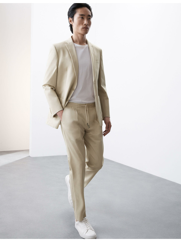 Marks & Spencer Lehké funkční kalhoty, mírně projmutý střih Marks & Spencer béžová