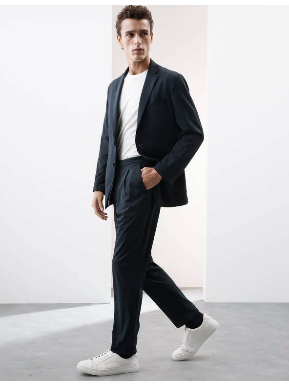 Marks & Spencer Oblekové kalhoty vhodné na cestování Marks & Spencer námořnická modrá