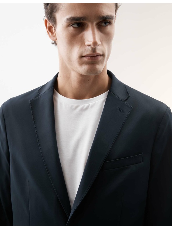 Marks & Spencer Sako mírně projmutého střihu vhodné na cestování Marks & Spencer námořnická modrá