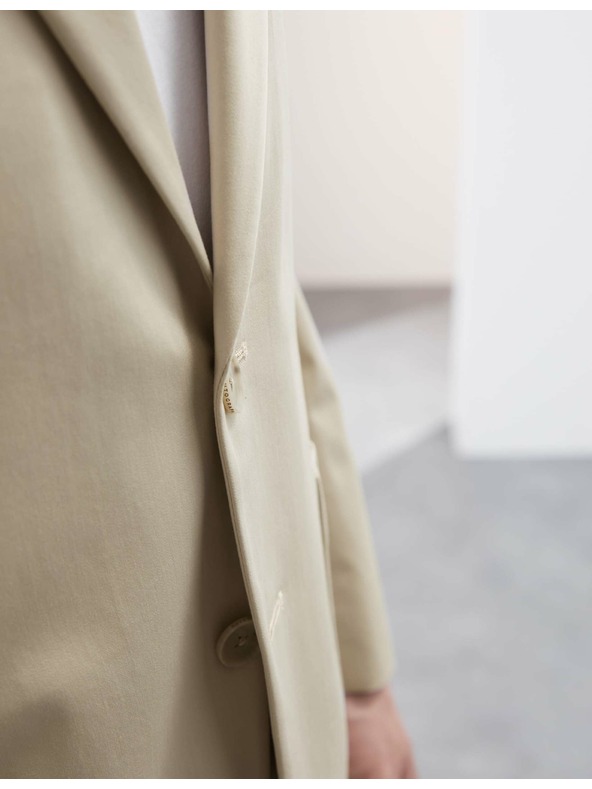 Marks & Spencer Blejzr s vysokým podílem bavlny, mírně projmutý střih Marks & Spencer béžová