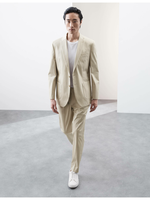 Marks & Spencer Blejzr s vysokým podílem bavlny, mírně projmutý střih Marks & Spencer béžová