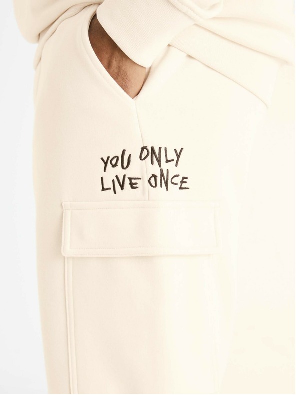 Celio Krémové pánské tepláky s kapsami Celio Boslap