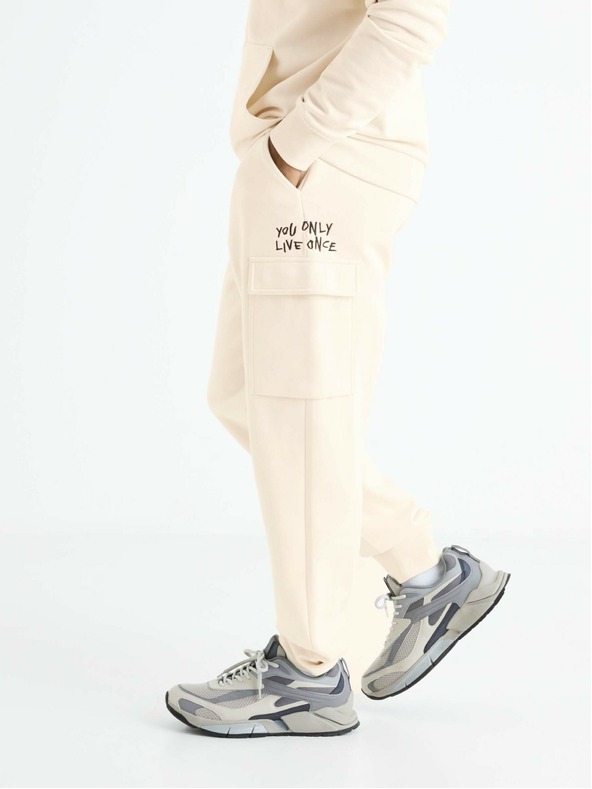 Celio Krémové pánské tepláky s kapsami Celio Boslap