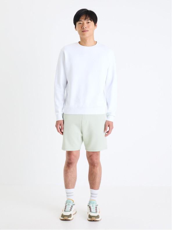 Celio Světle zelené pánské teplákové kraťasy Celio Toshort