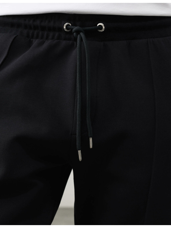 Marks & Spencer Rovné tepláky Pintuck s vysokým podílem bavlny Marks & Spencer černá