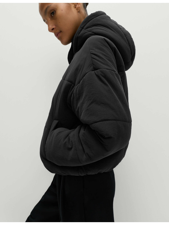 Marks & Spencer Prošívaná bunda s kapucí s technologií Thermowarmth™ Marks & Spencer černá
