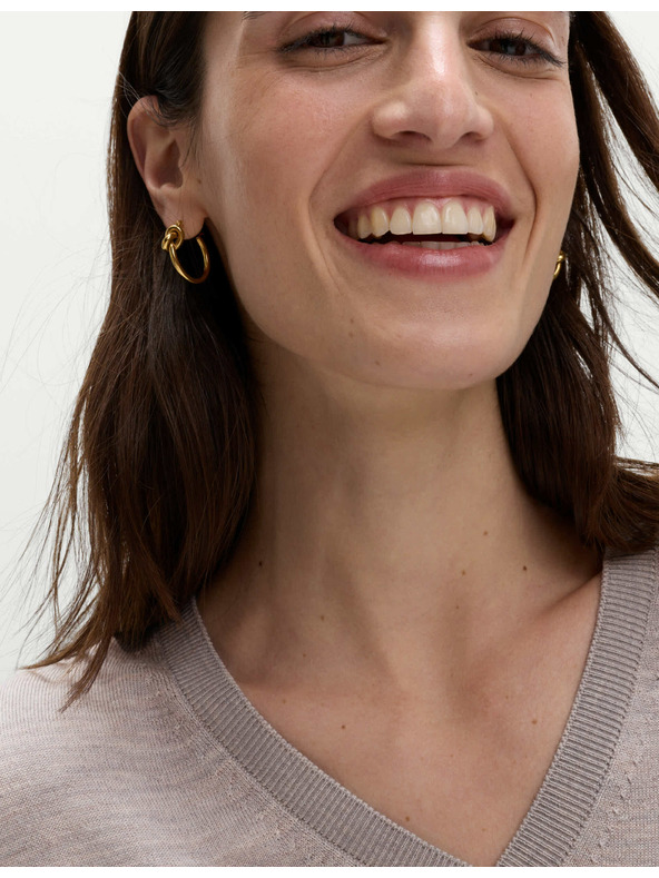 Marks & Spencer Svetr s výstřihem do V z vlny Merino Marks & Spencer béžová