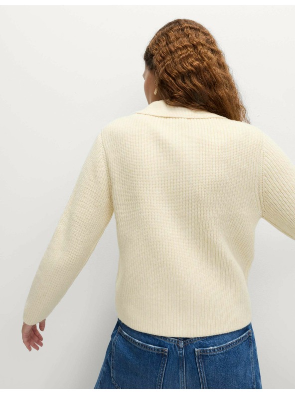 Marks & Spencer Pletená bunda s mračnatými vlákny a ozdobnými kapsami Marks & Spencer smetanová