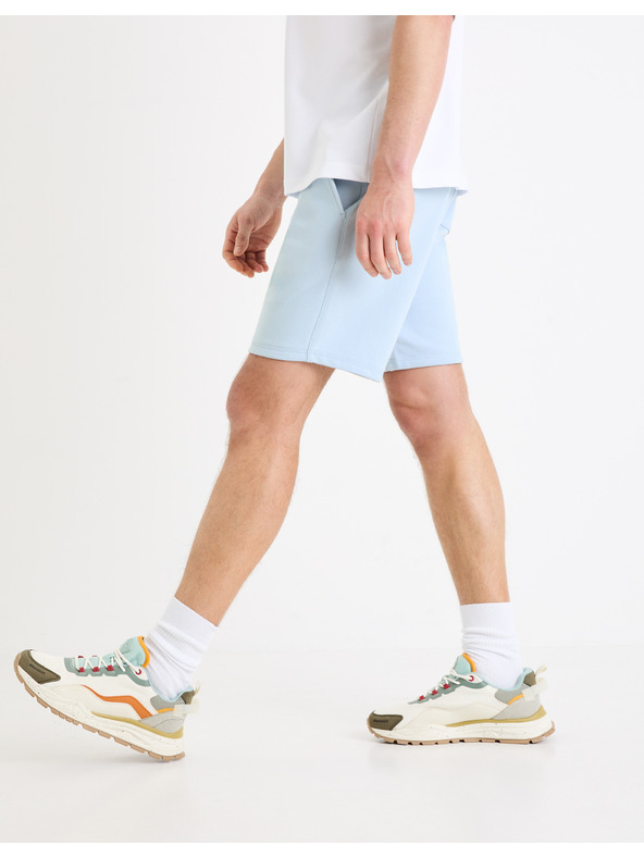 Celio Světle modré pánské teplákové kraťasy Celio Toshort