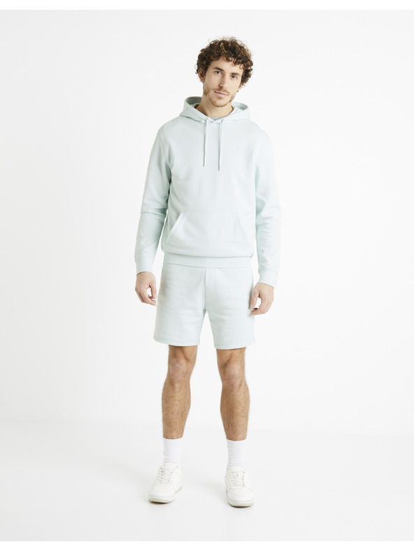 Celio Světle modré pánské teplákové kraťasy Celio Toshort
