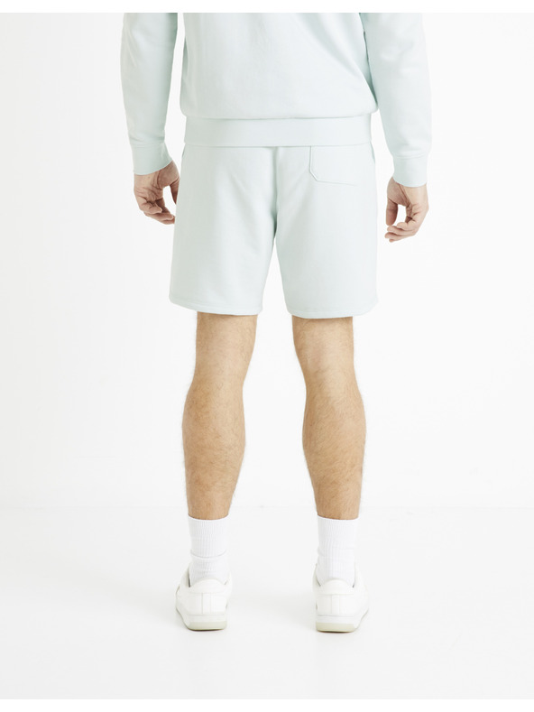 Celio Světle modré pánské teplákové kraťasy Celio Toshort