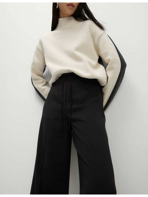 Marks & Spencer Krepové kalhoty se širokými nohavicemi a elastickým pasem Marks & Spencer černá