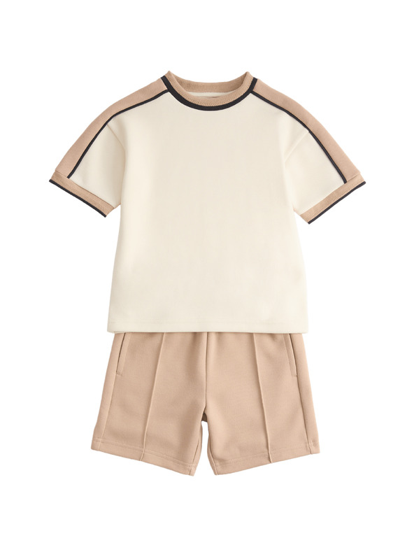 Marks & Spencer Outfit piké trička a šortek ze směsi bavlny (2–10 let) Marks & Spencer smetanová