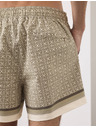 Marks & Spencer Rychleschnoucí koupací šortky s geometrickým potiskem Marks & Spencer zelená