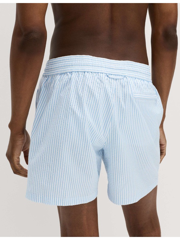 Marks & Spencer Plavecké šortky z mačkaného materiálu Marks & Spencer modrá