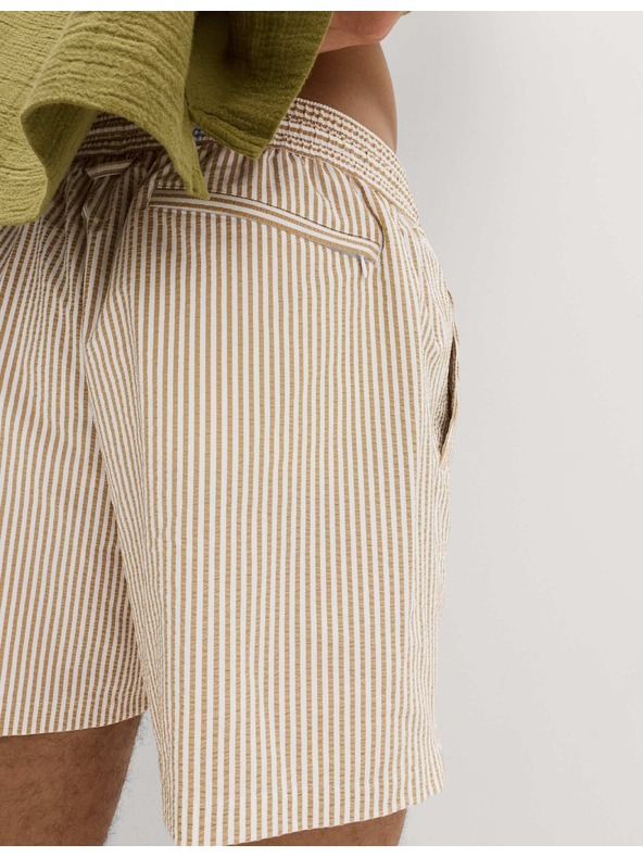 Marks & Spencer Plavecké šortky z mačkaného materiálu Marks & Spencer béžová