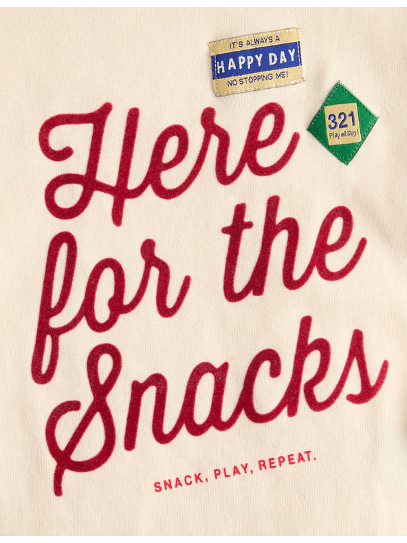 Marks & Spencer Top z čisté bavlny s nápisem „For The Snacks“ (2–8 let) Marks & Spencer smetanová